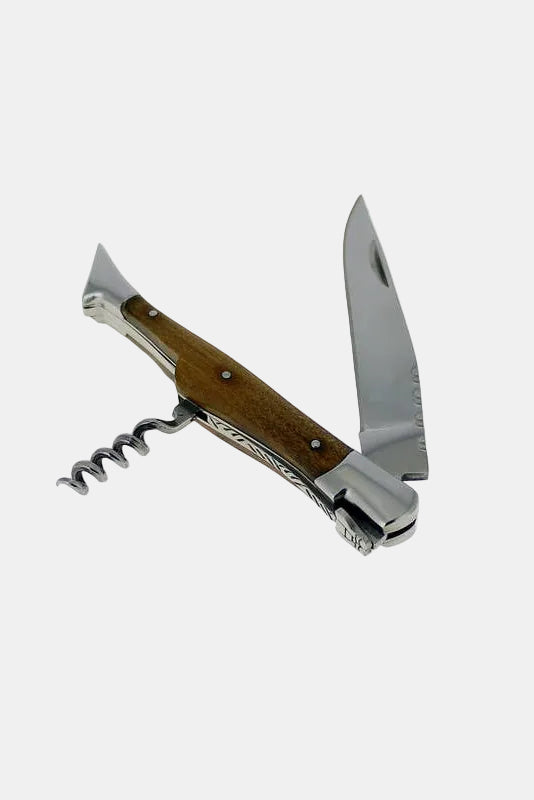 Multitool with wooden handle and metal blade on a white background