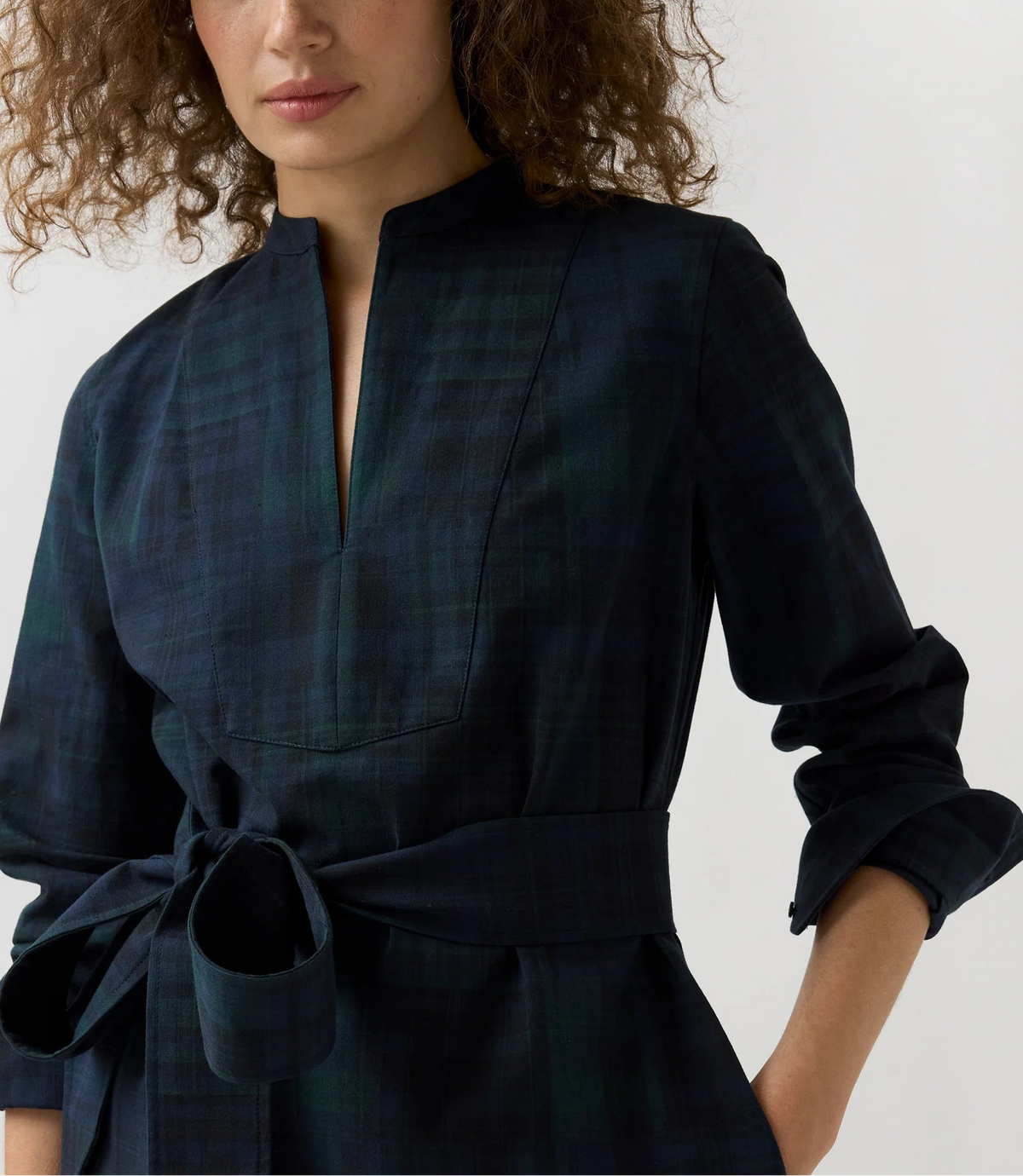 The Copper Shed Mackey cotton tartan dress with mandarin collar, tuxedo bib, and self-tie waist.