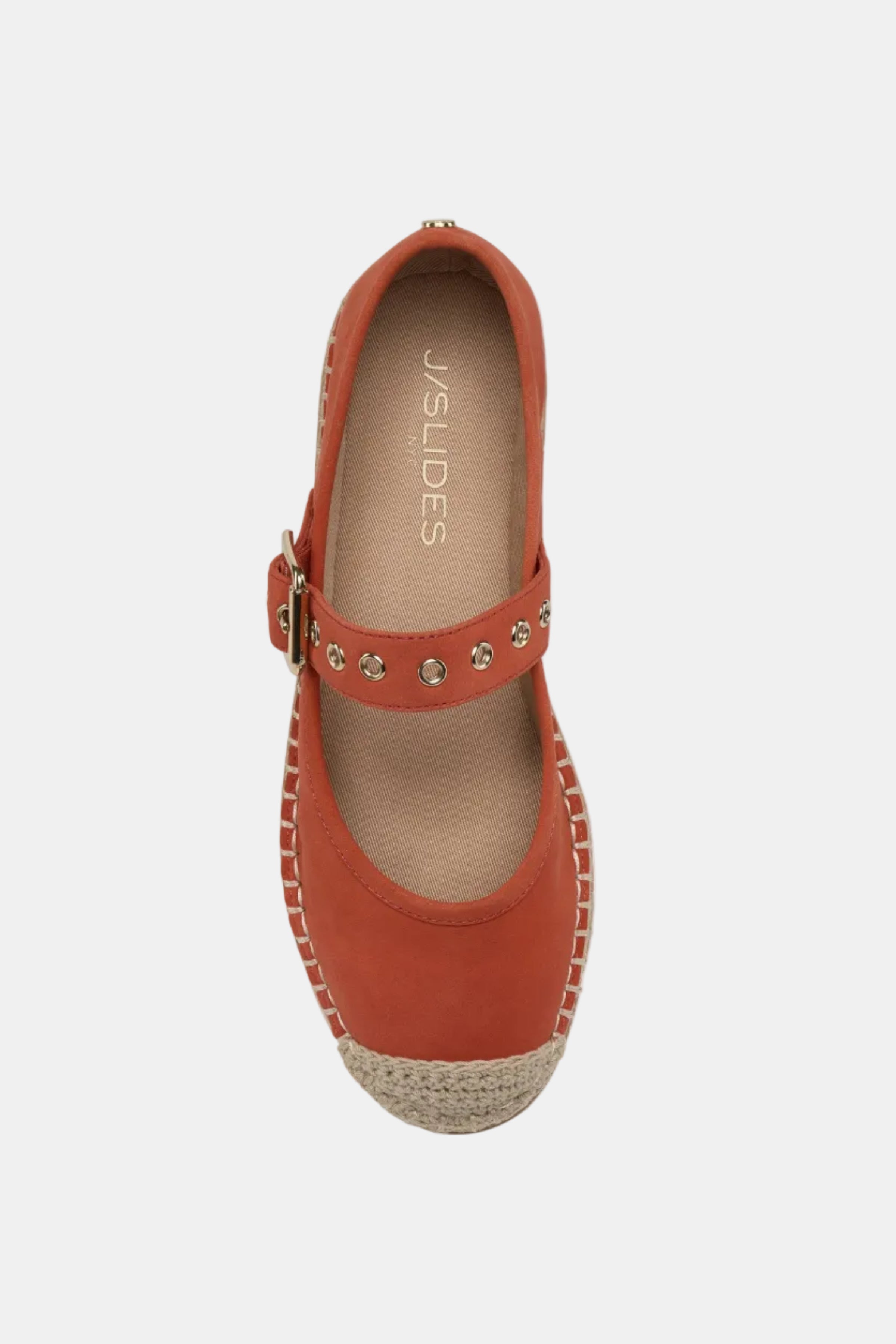 Orange espadrille shoe with studded detail on a white background