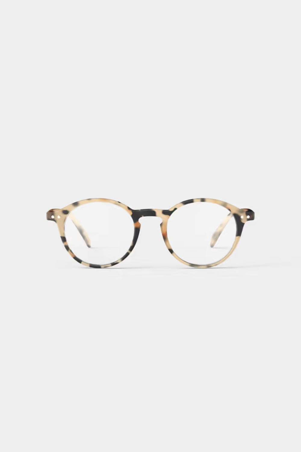 Round eyeglasses with a tortoiseshell pattern in beige, brown, and black, shown from the front on a light gray background.