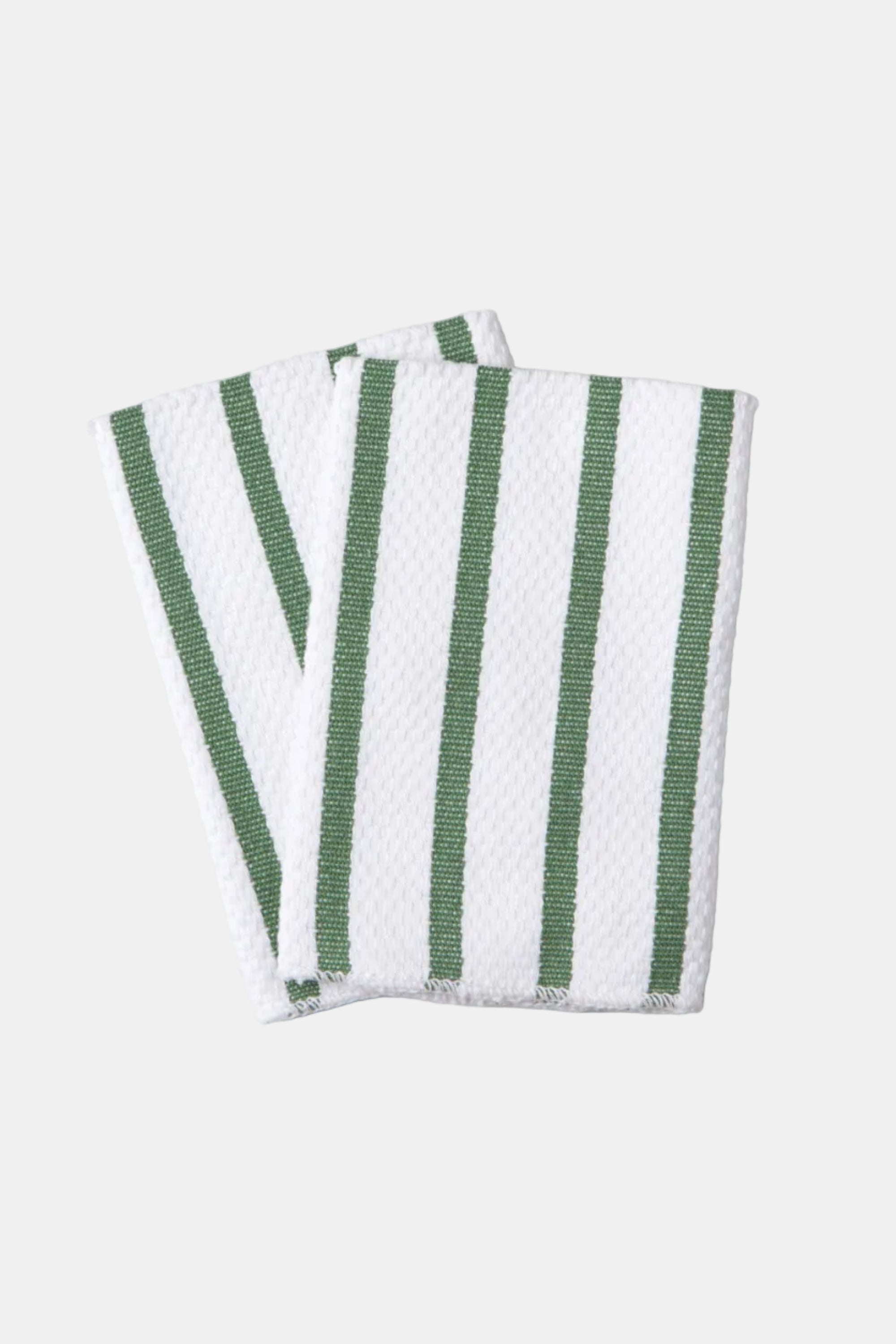 Two green and white striped towels on a light gray background