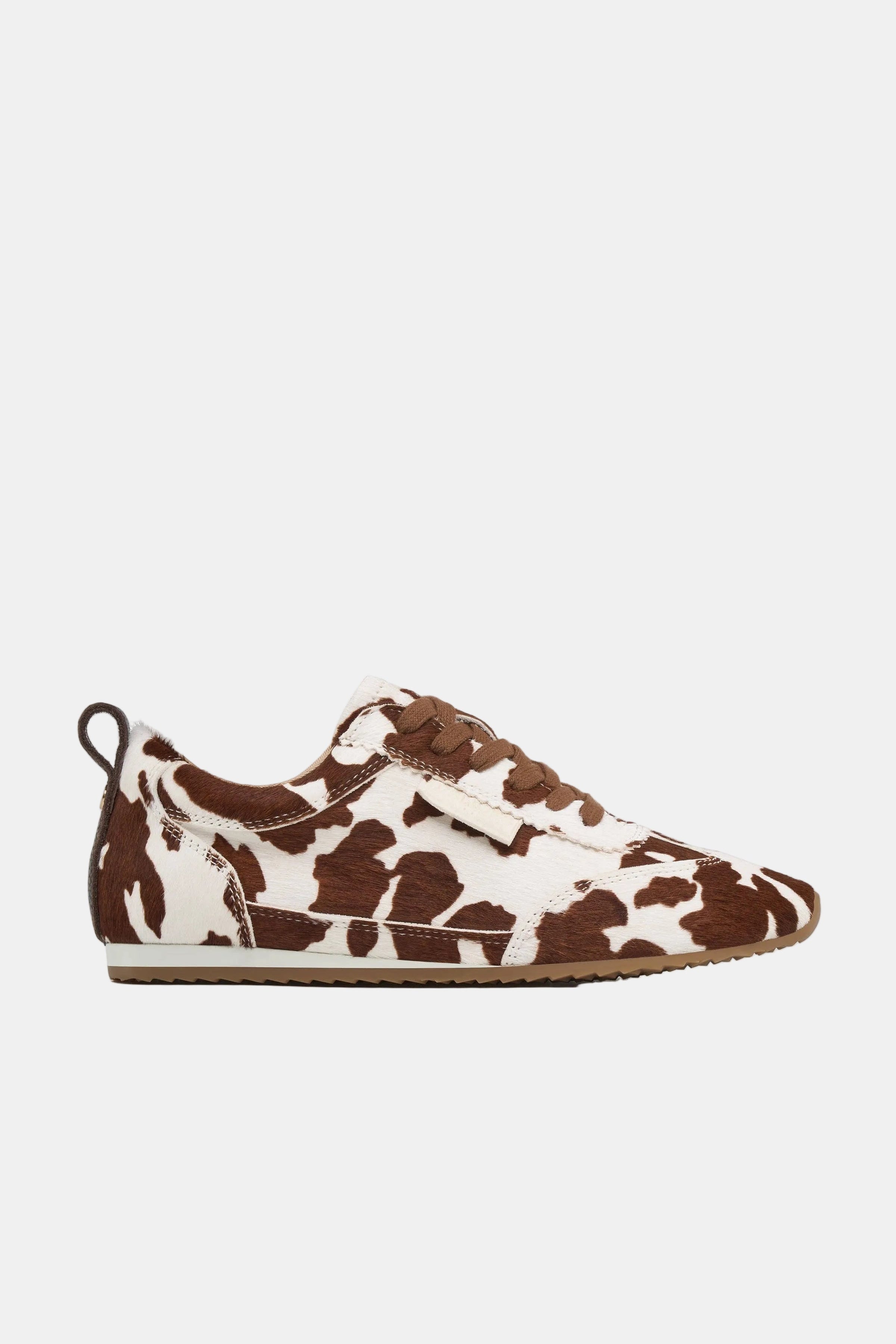 Brown and white cow print shoe on a white background