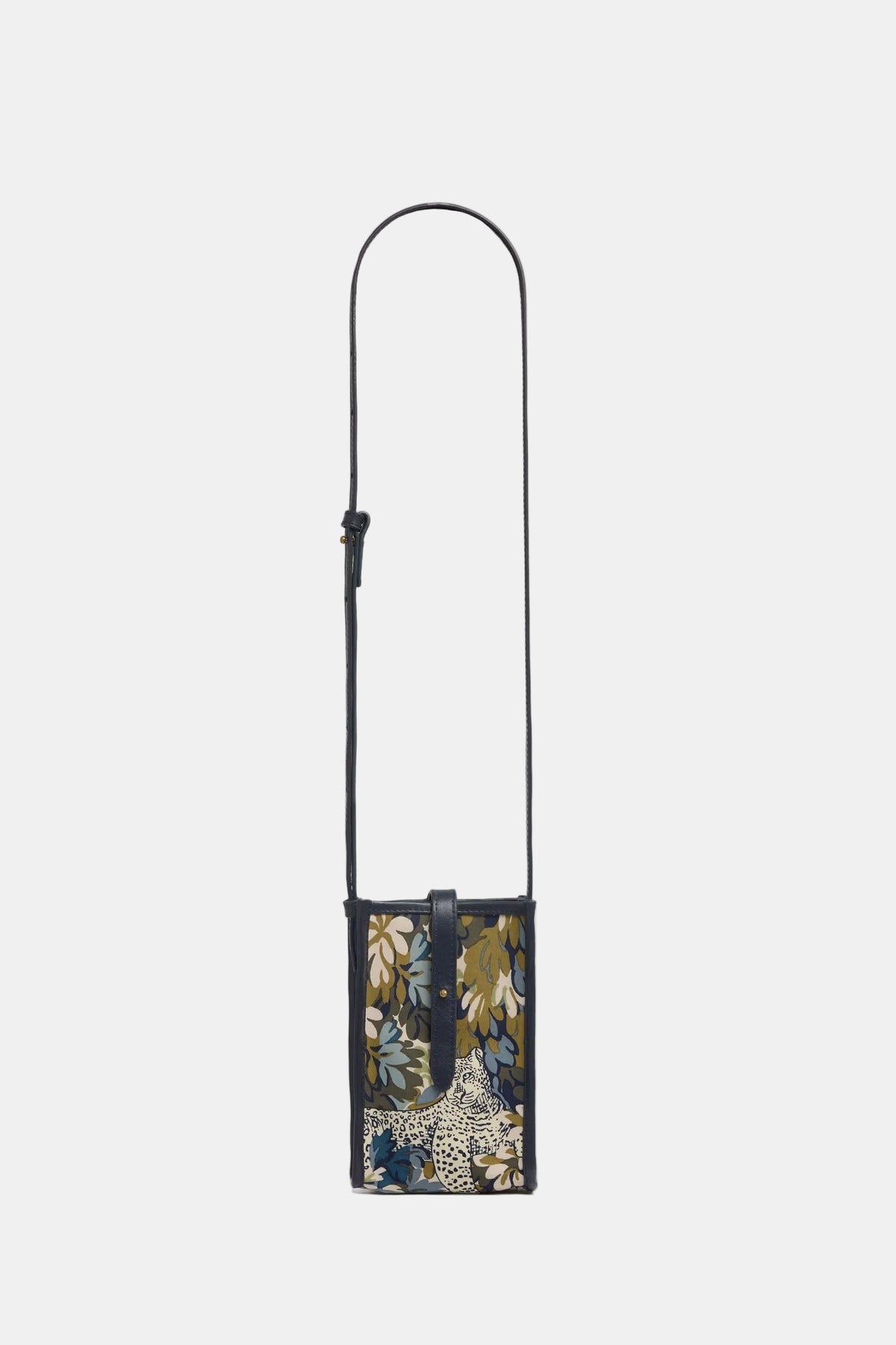 A long, narrow crossbody bag with a black strap and a dark floral print body, featuring a leopard print motif near the bottom, shown against a light gray background.