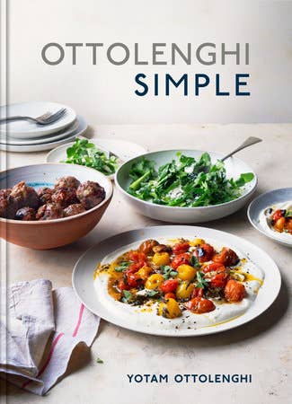 Book cover of 'Ottolenghi Simple' with food on a table