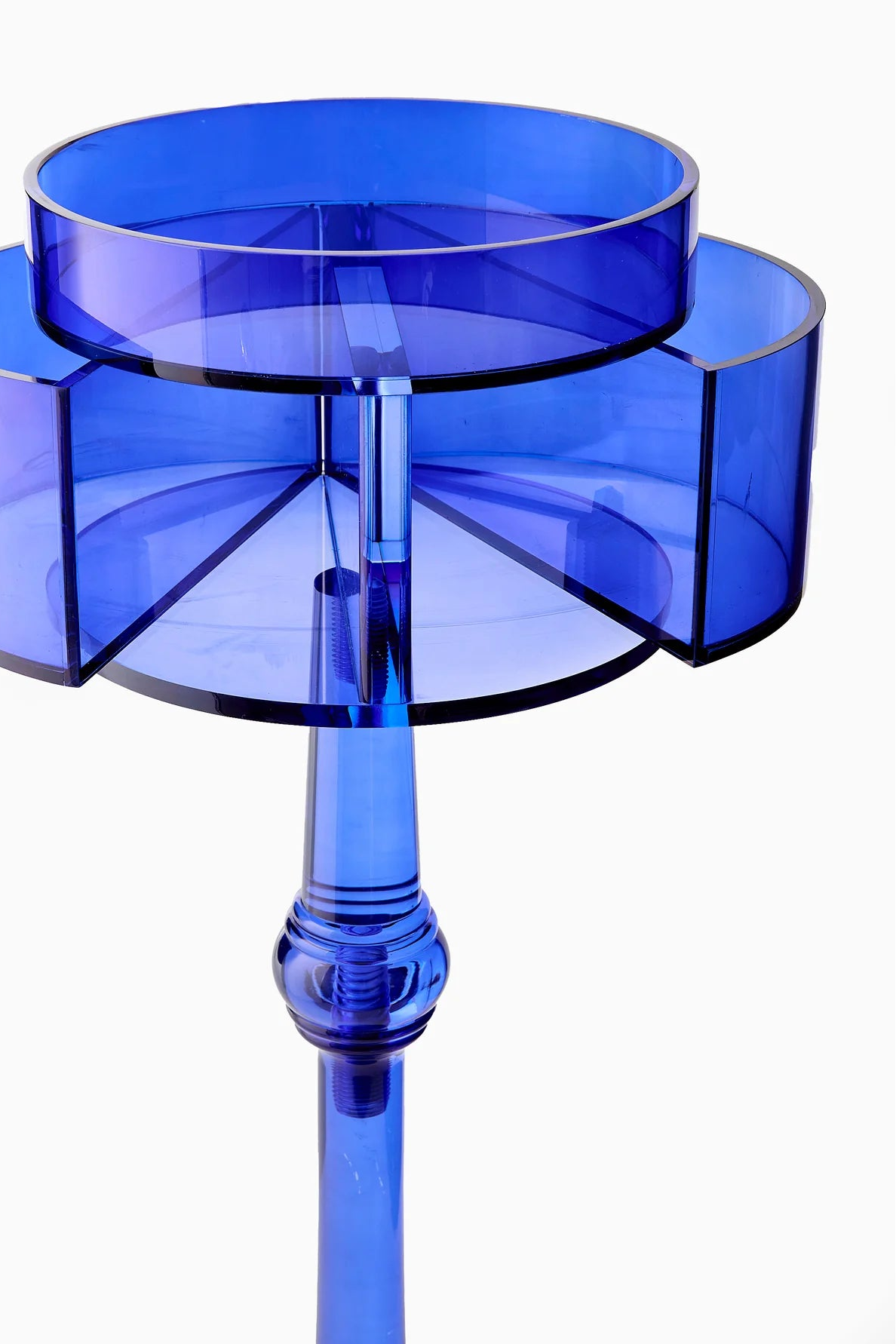 Blue transparent candle holder on a white background