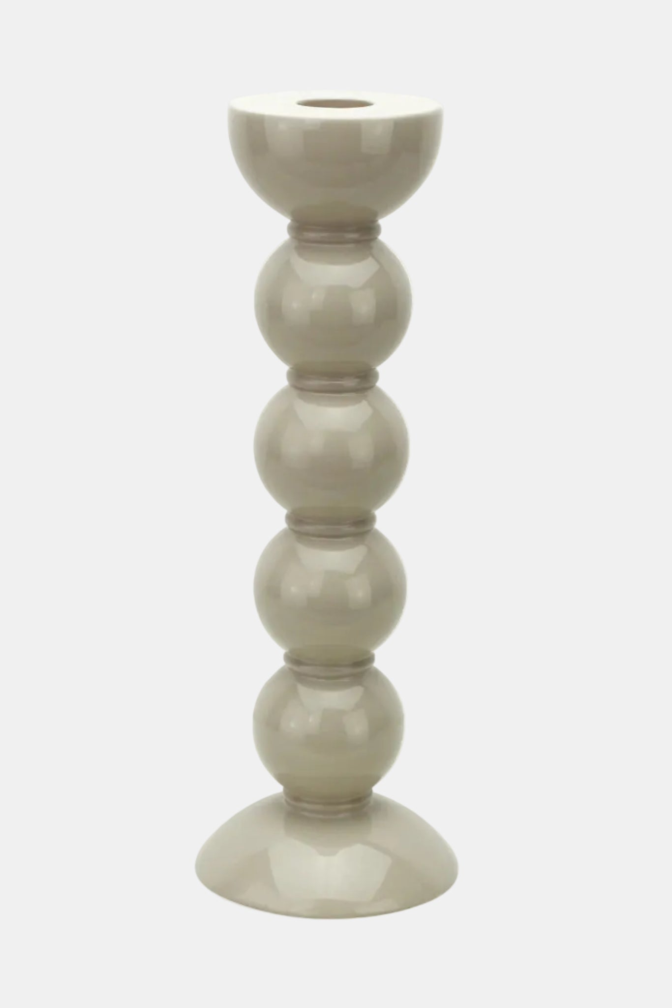 Beige ceramic candle holder on a white background