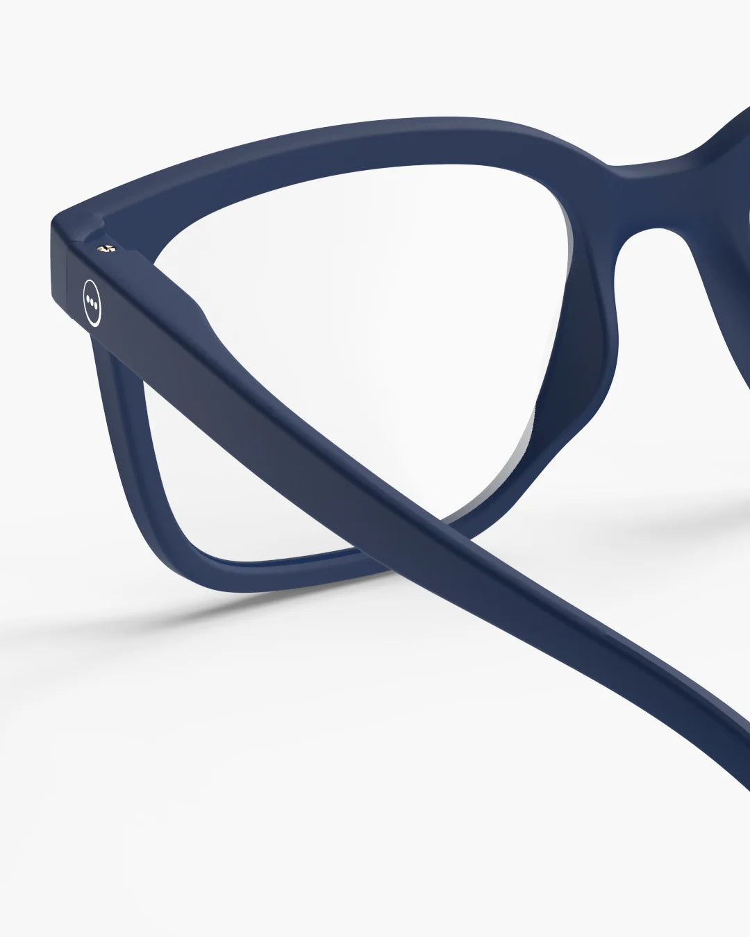 Black eyeglasses on a light gray background