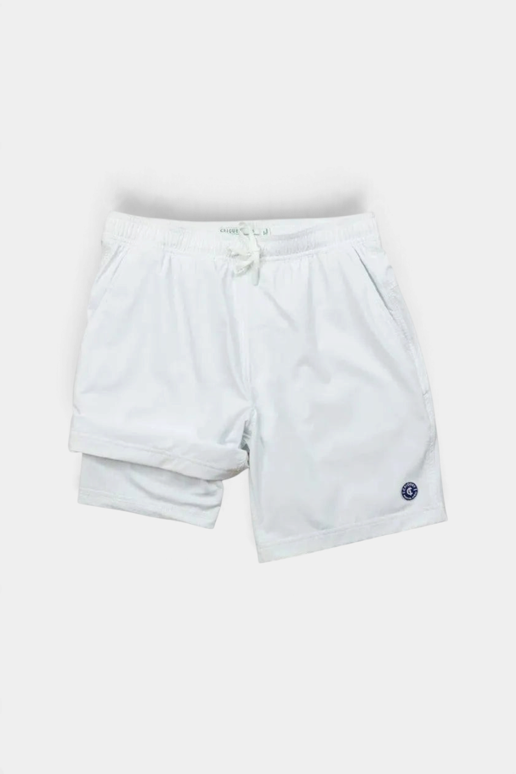 White shorts with a small logo on a white background