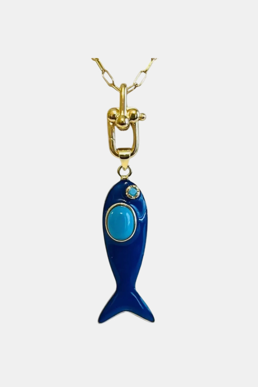 Blue fish-shaped pendant with turquoise stone on a gold chain against a white background