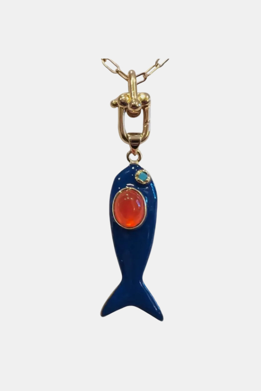 Blue fish-shaped pendant with a red stone on a white background