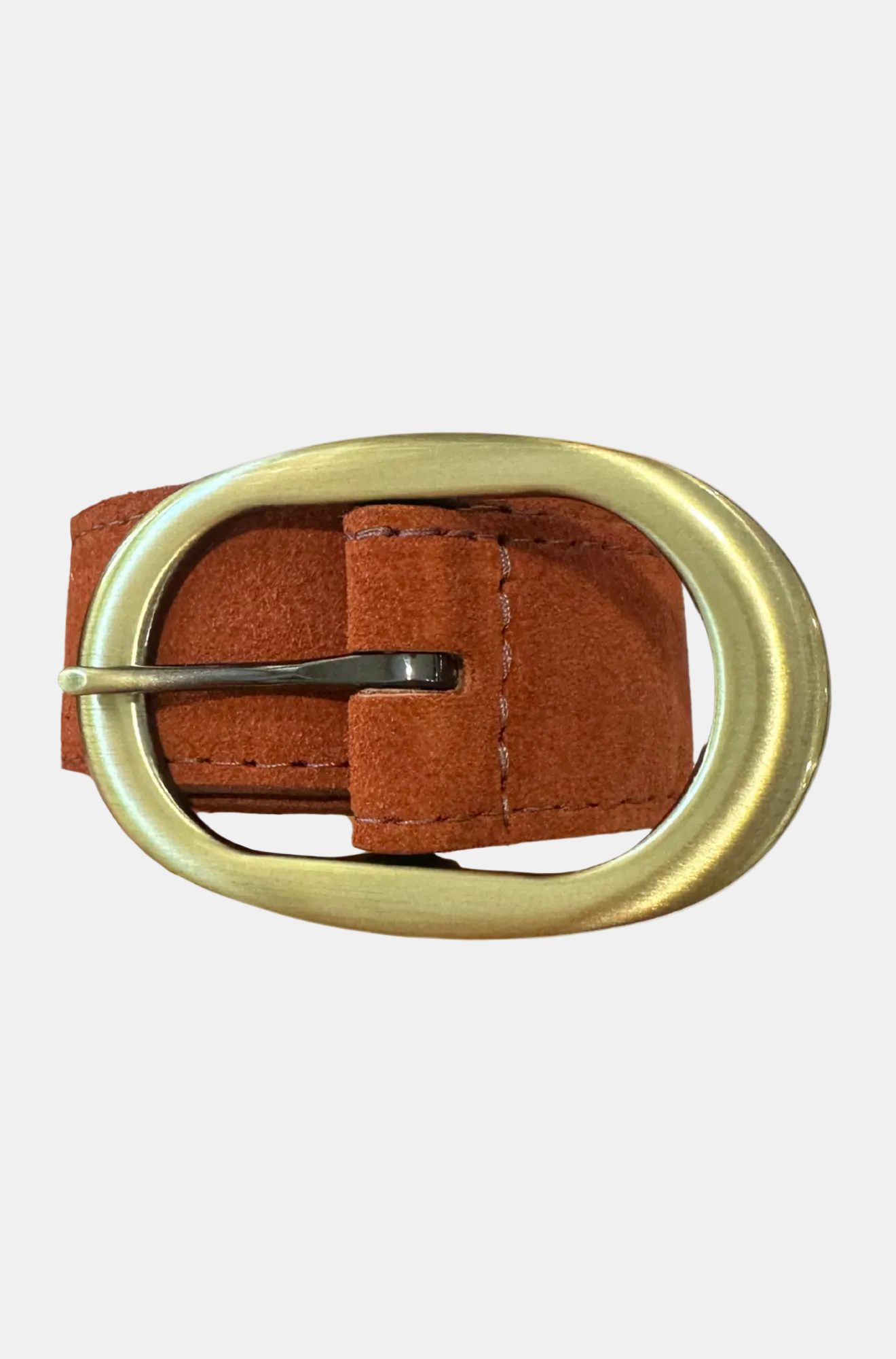 Brown leather belt with brass buckle held by a hand on a white background