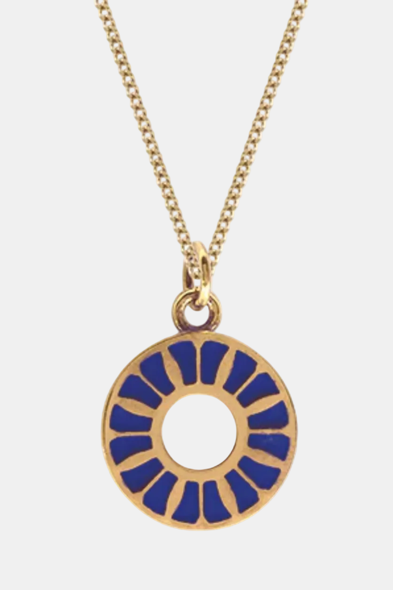 Gold necklace with a blue circular pendant on a white background