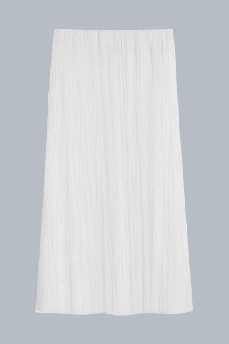 White skirt with subtle pattern on a white background