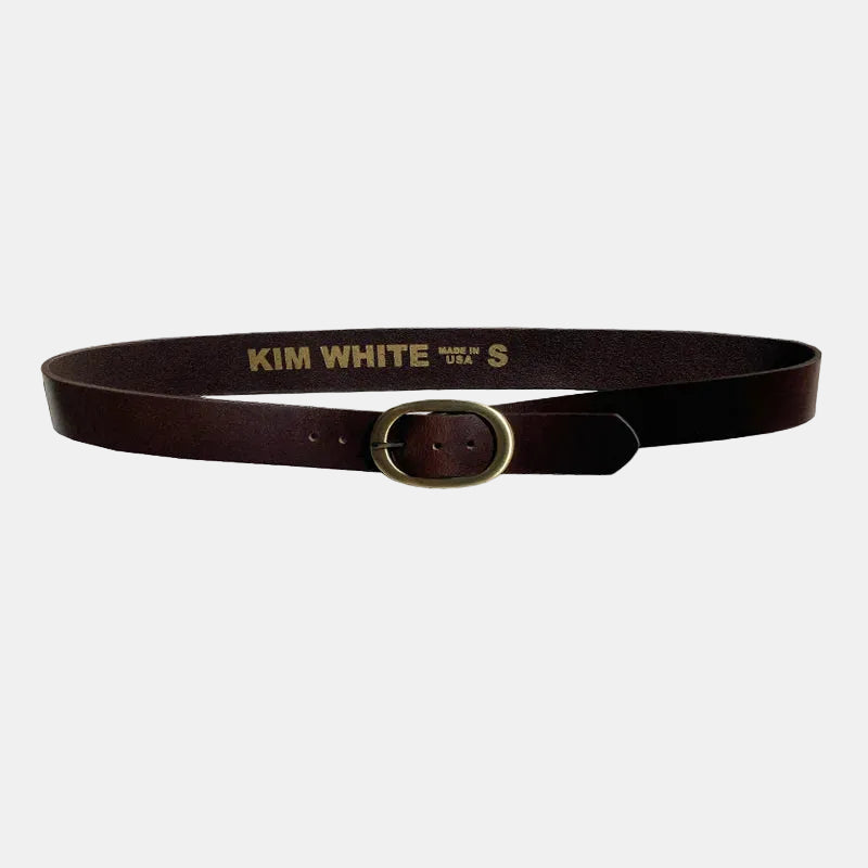 Brown belt with gold buckle and 'KIM WHITE' engraving on a white background