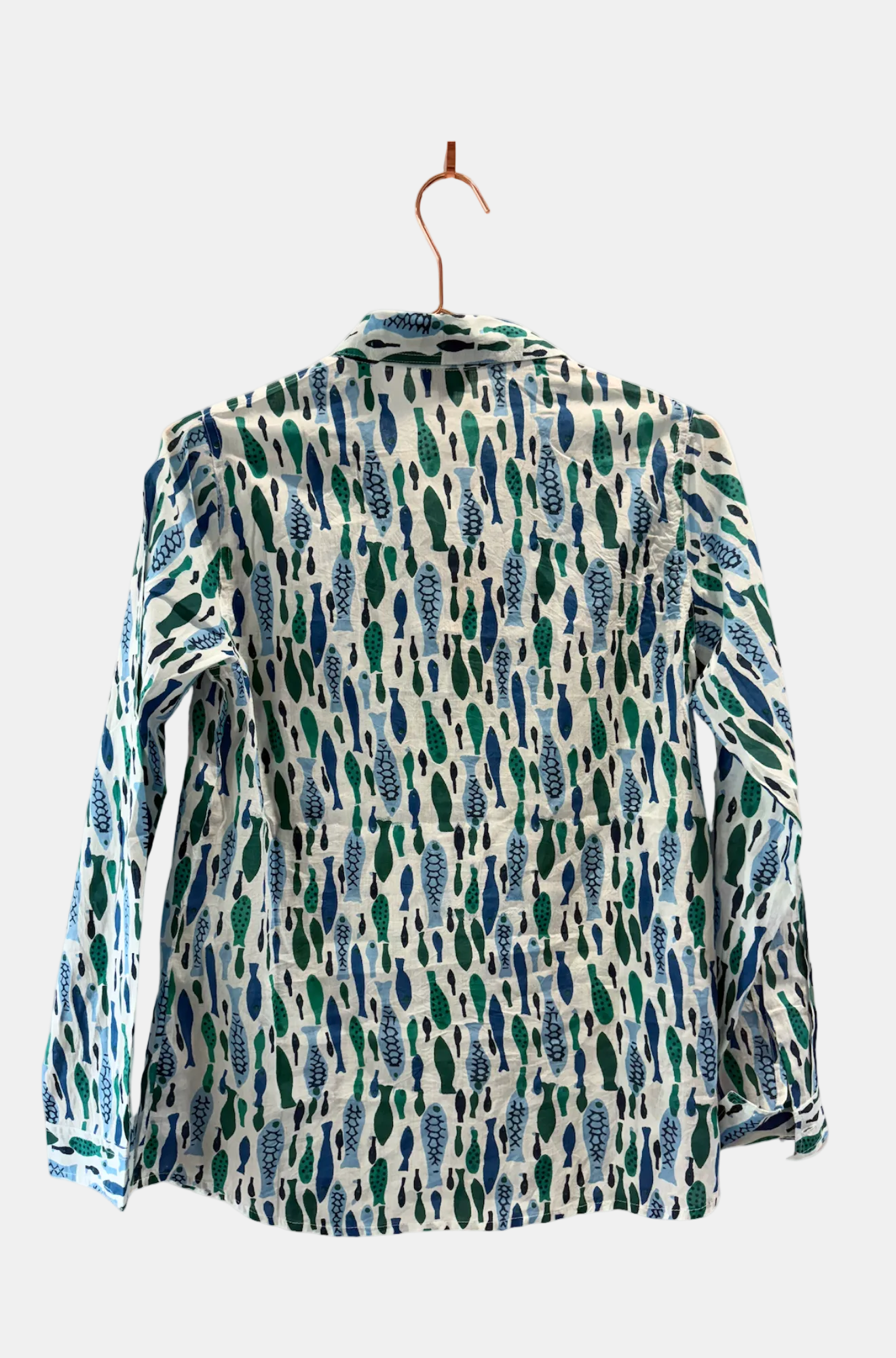 Long-sleeve shirt with a leaf pattern on a hanger against a white background
