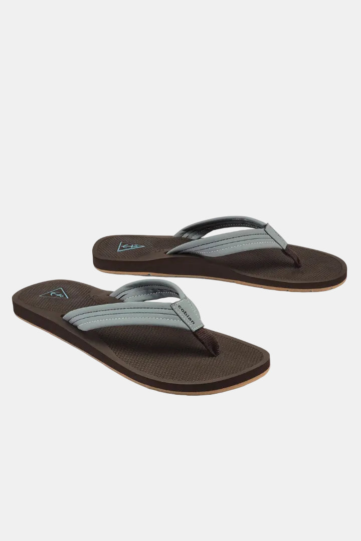 Pair of brown and gray flip-flops on a white background