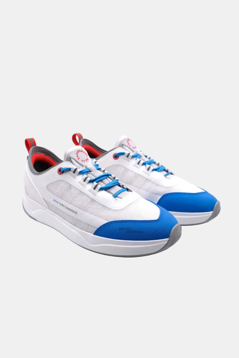 White and blue athletic shoes with red accents on a white background