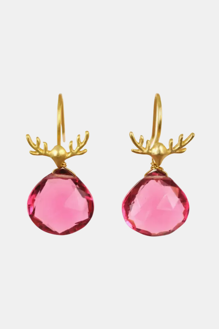 A pair of gold drop earrings featuring faceted pink teardrop gemstones with gold antler-shaped tops, shown against a plain white background.