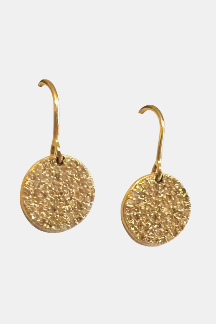 A pair of gold druzy disc drop earrings with curved hooks, shown against a plain white background.