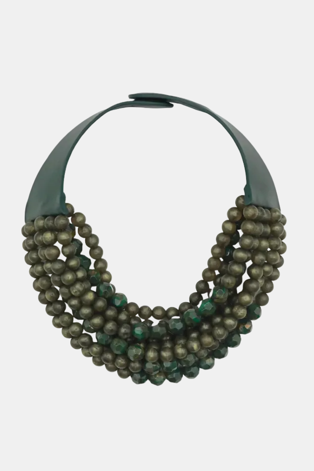 A multi-strand statement necklace featuring dark green leather-like bands connected by rows of metallic bronze and dark green faceted beads, shown against a plain white background.