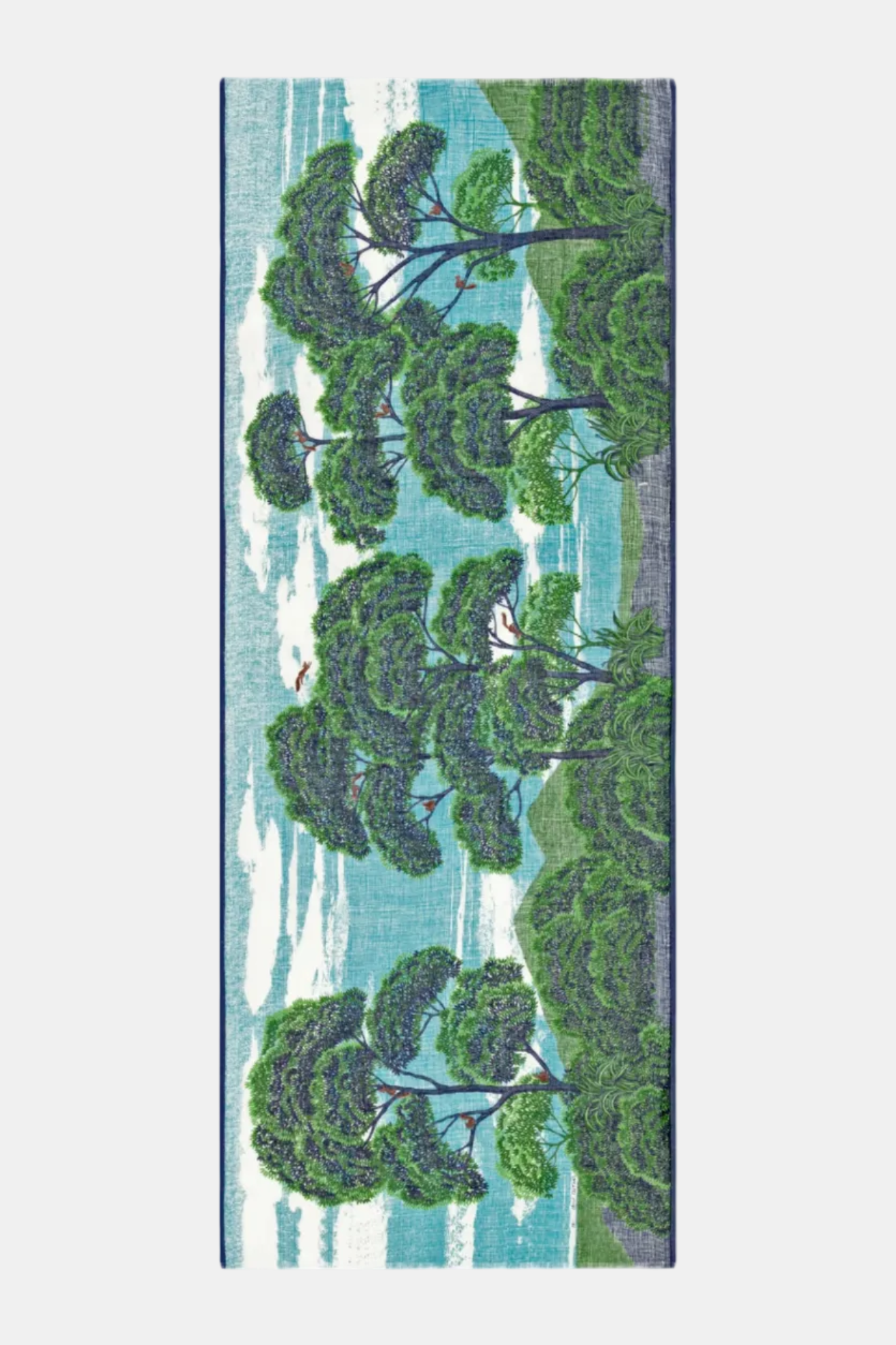 Textile with green leaf pattern on a blue background