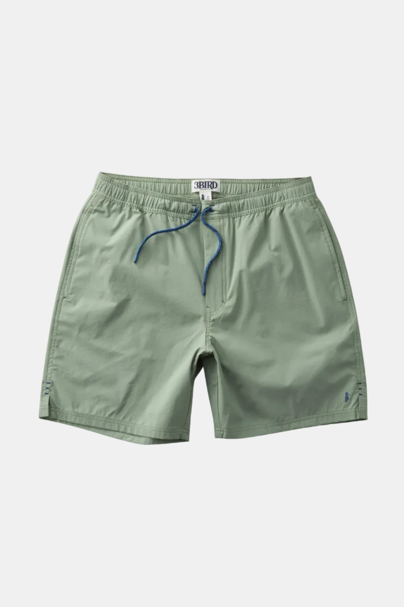 Green shorts with a drawstring on a white background