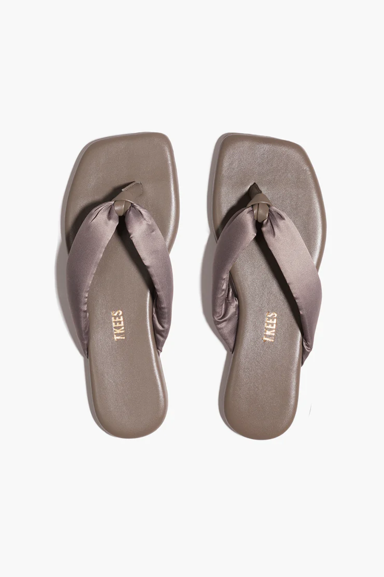Pair of gray sandals on a white background