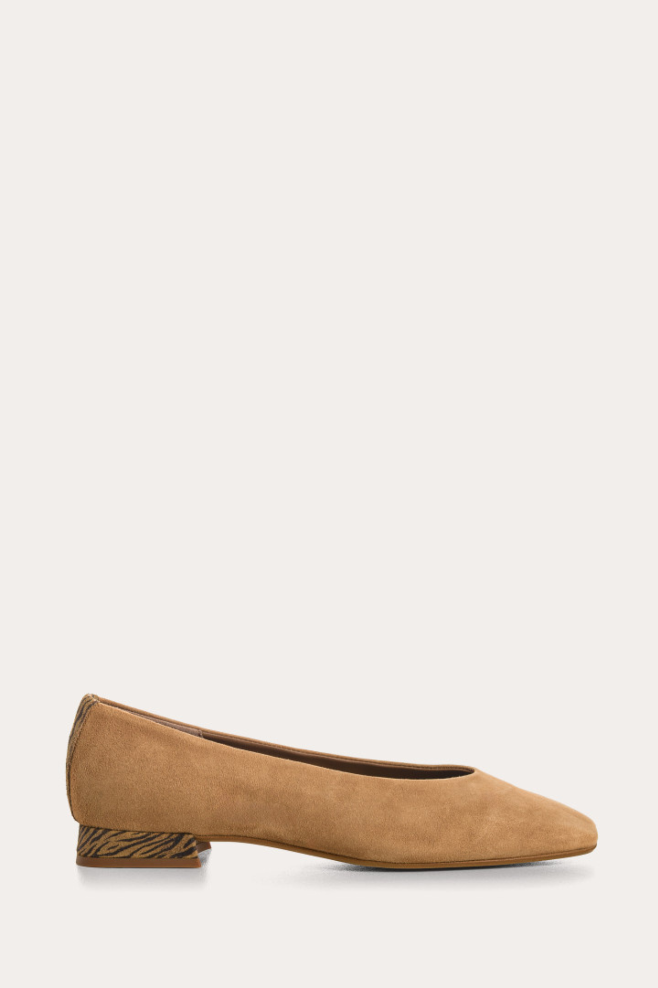 Tan shoe on a white background