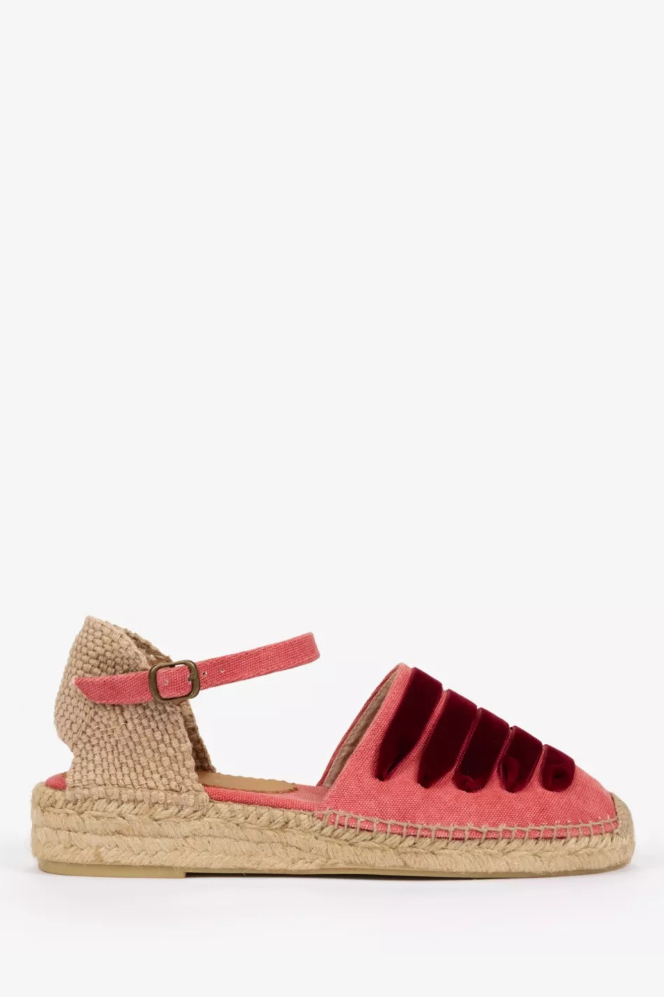 Pink sandal with a jute sole on a white background
