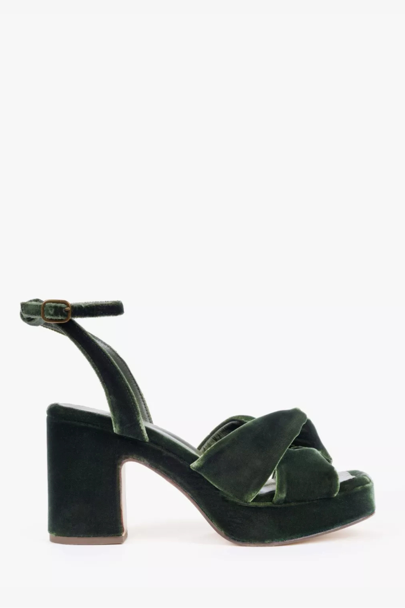 Green sandal with block heel on a white background