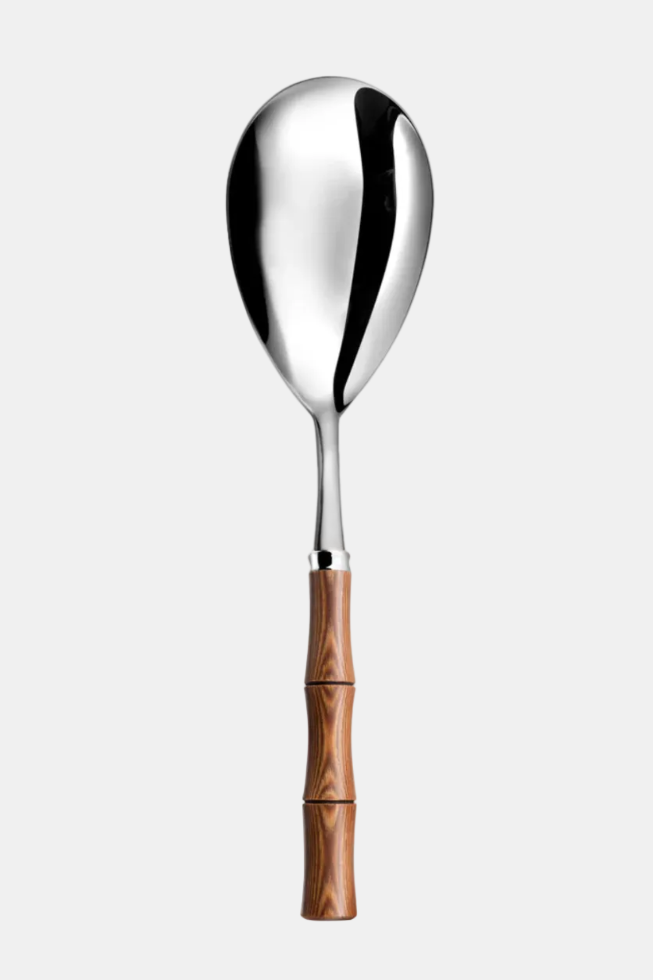 Spoon with wooden handle on a white background