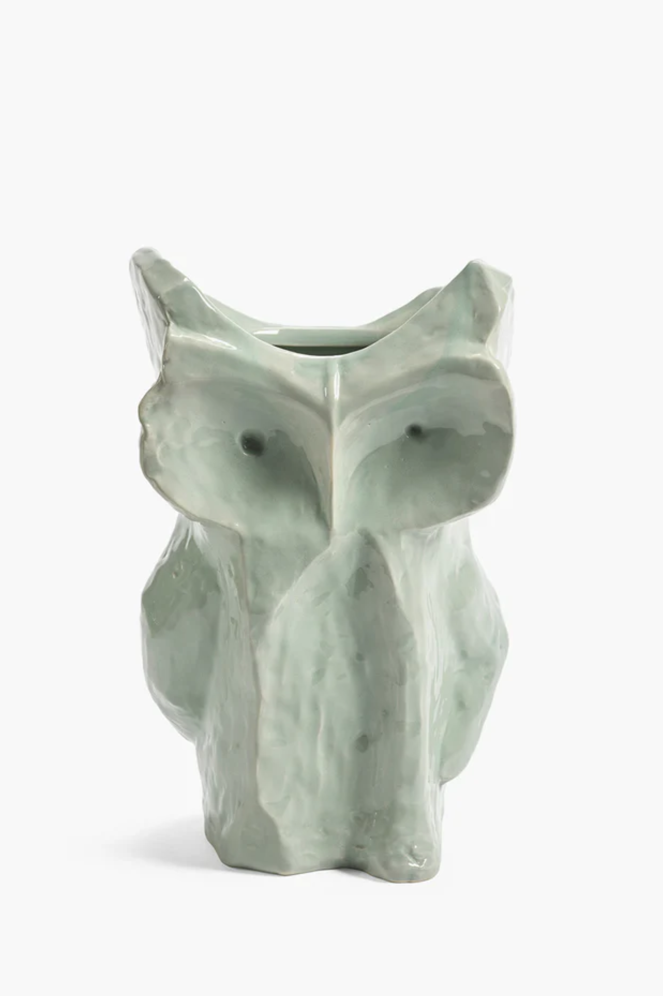 Ceramic owl-shaped vase on a white background