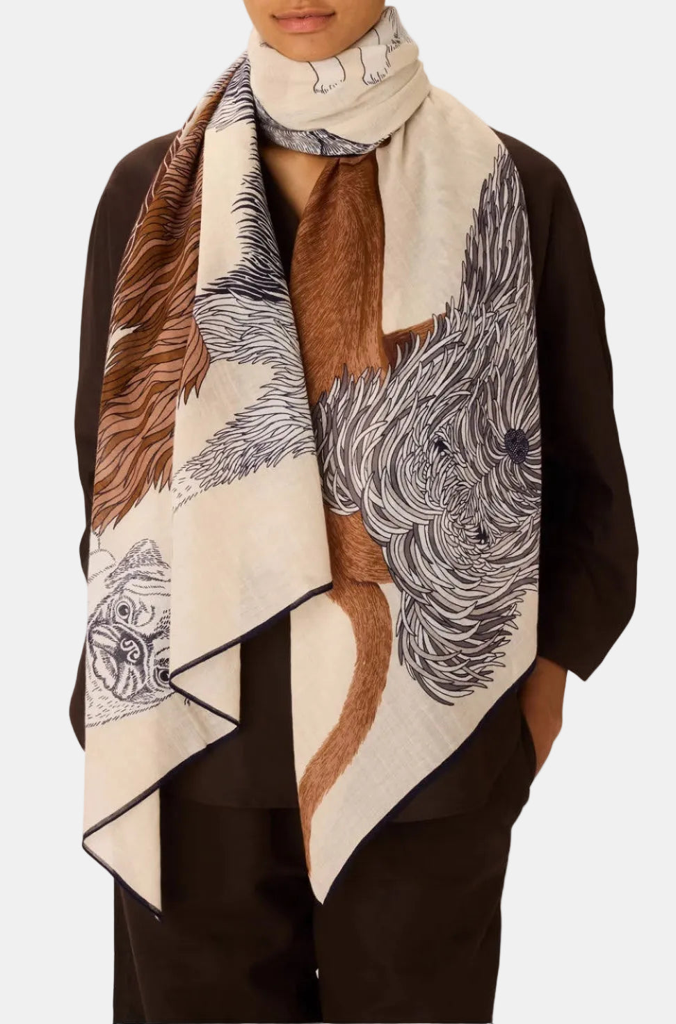 Woman wearing a patterned scarf with a white background
