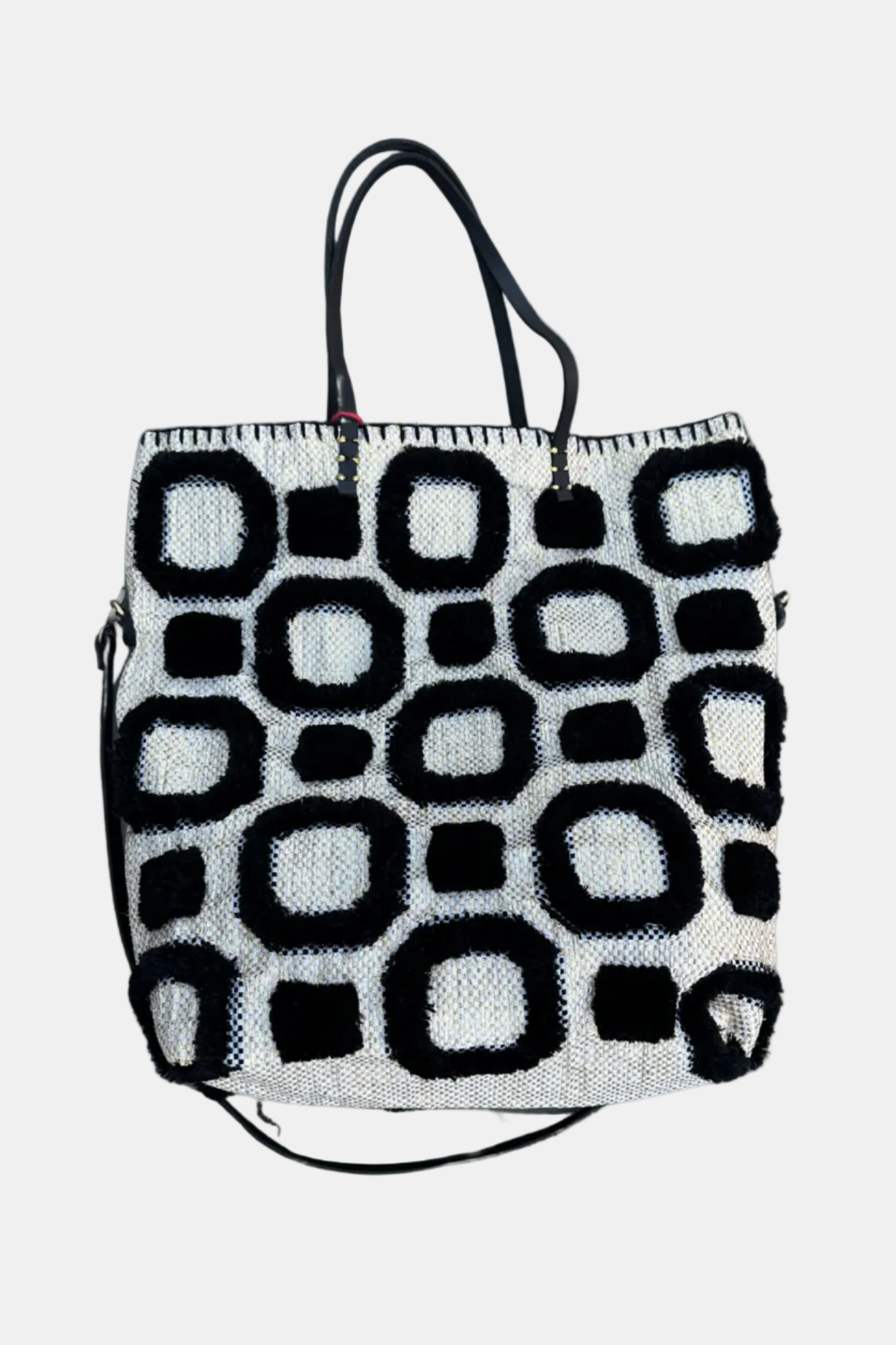 Black and white patterned bag on a white background