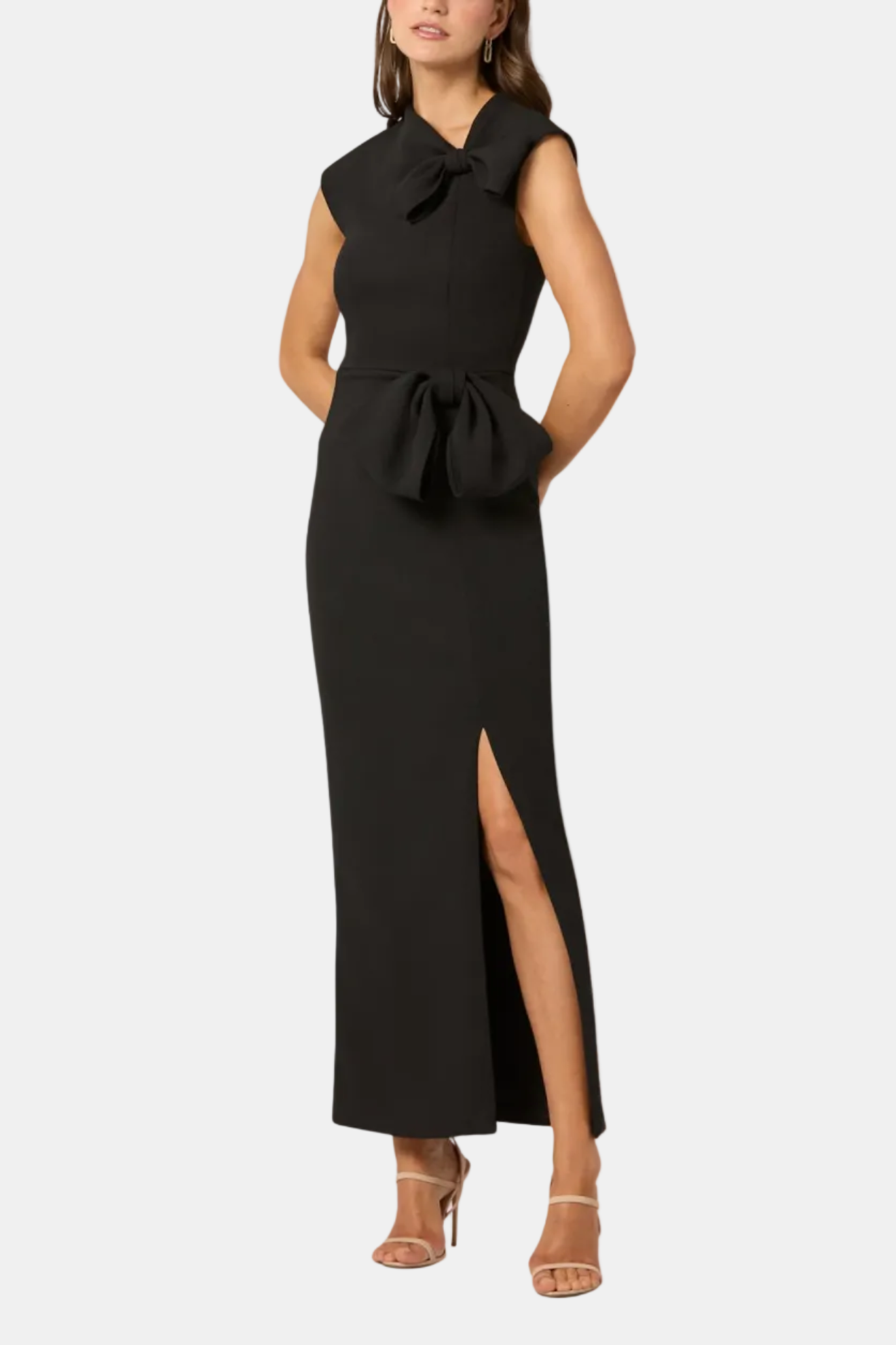 Black sleeveless dress with a bow detail on a white background