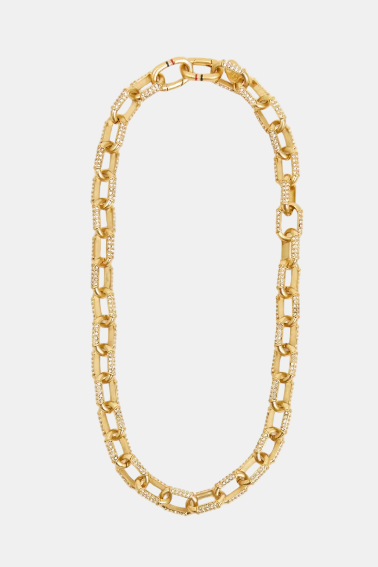Gold chain necklace on a white background