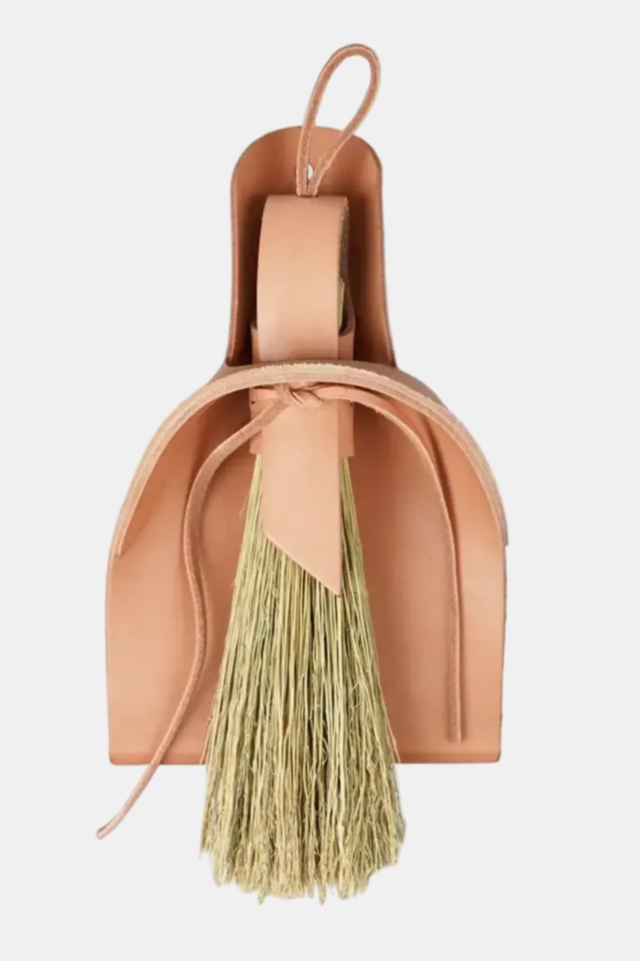 Pink dustpan with a broom on a white background