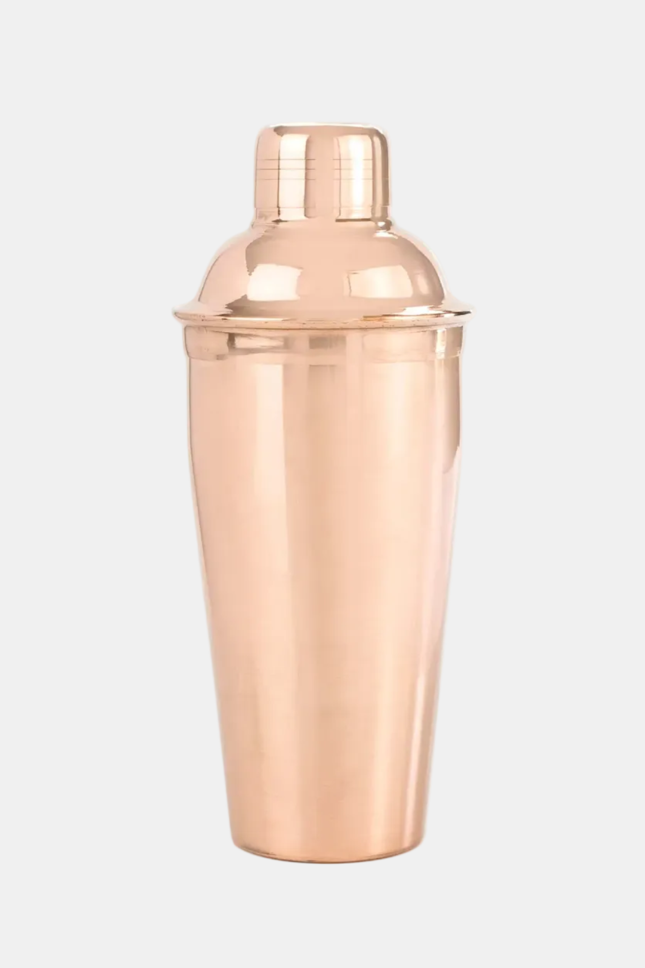 Rose gold cocktail shaker on a white background