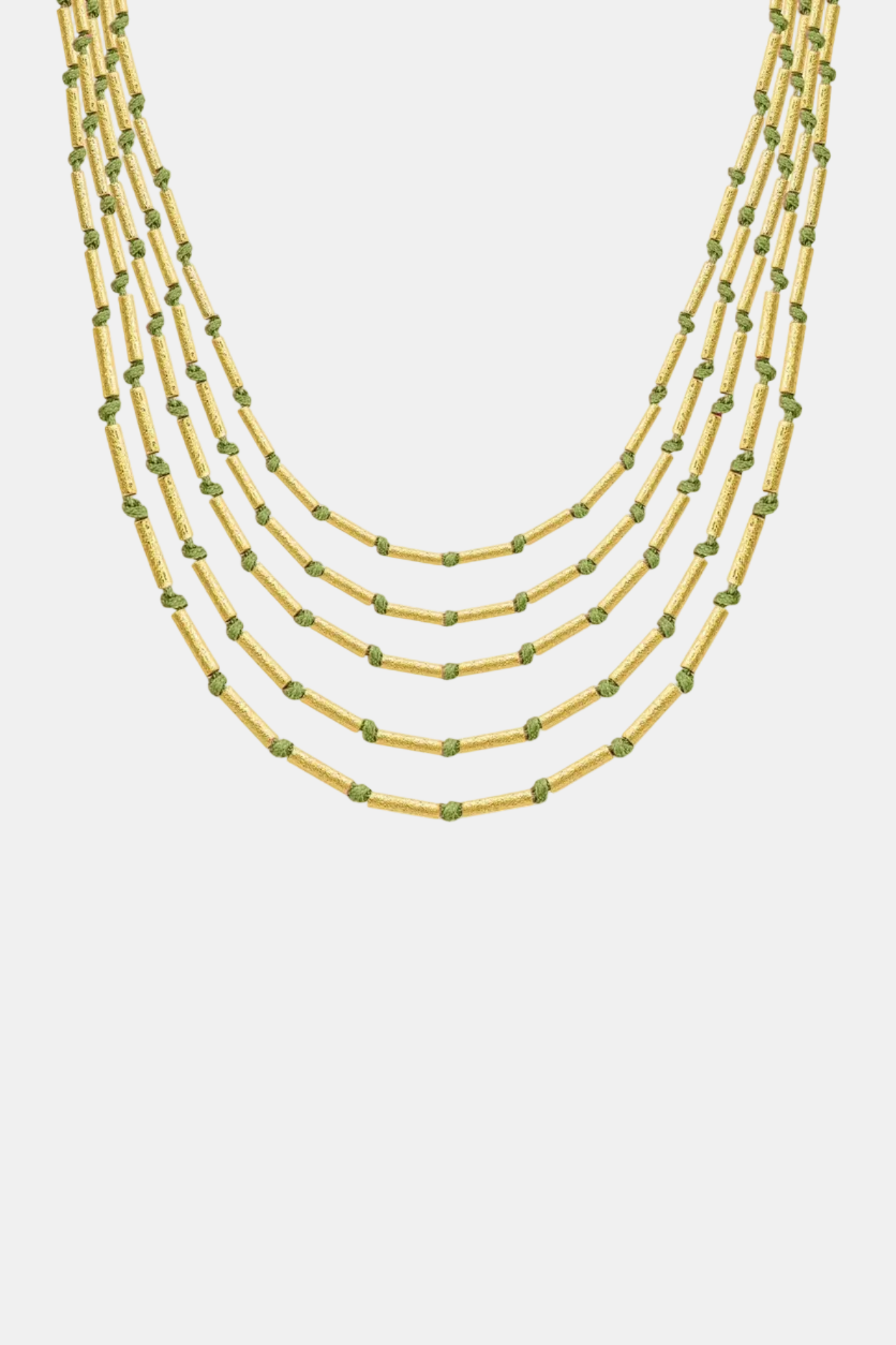 Multistrand necklace with green beads on a white background