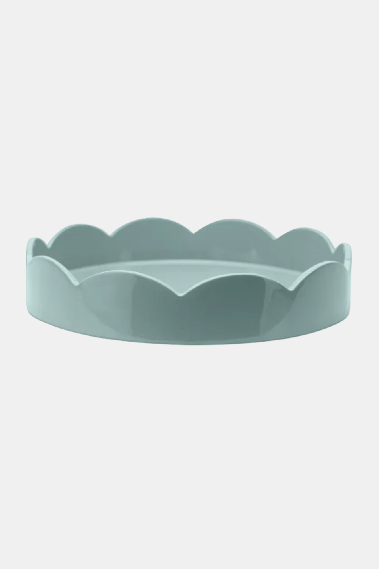 Light blue scalloped-edge bowl on a white background