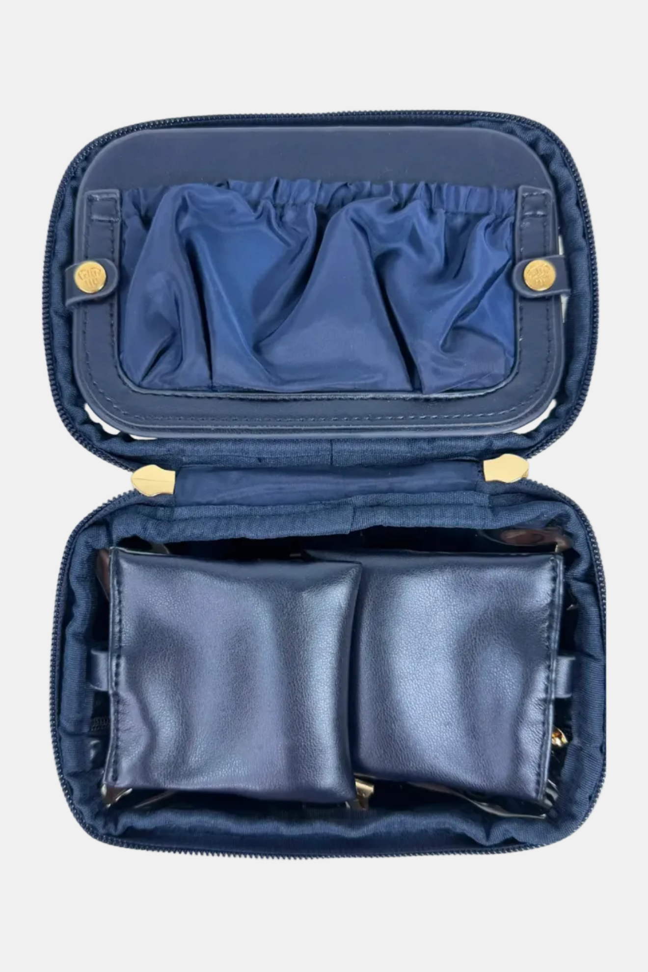 Open blue jewelry case with compartments on a white background