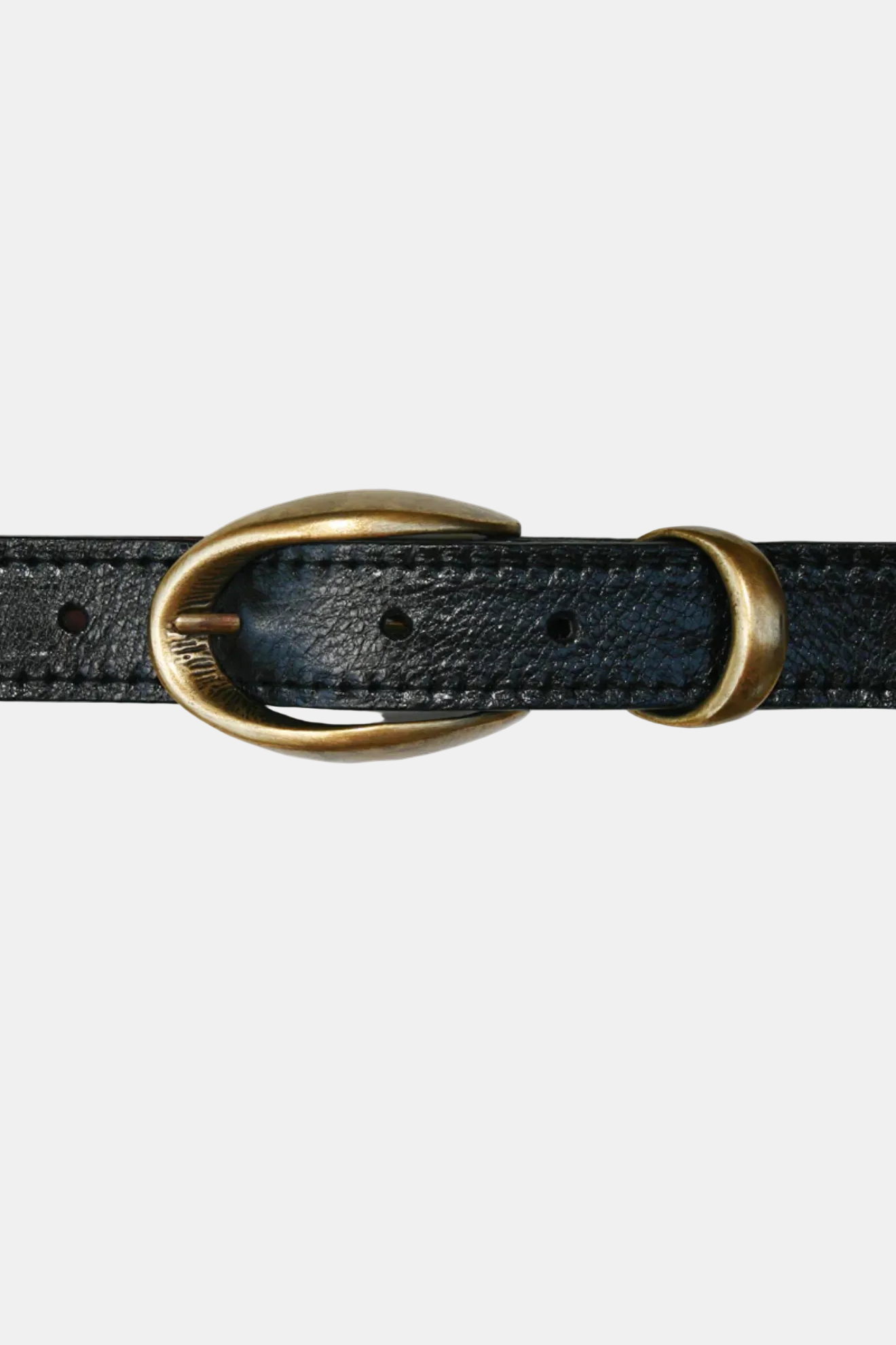 Black leather belt with a brass buckle on a white background