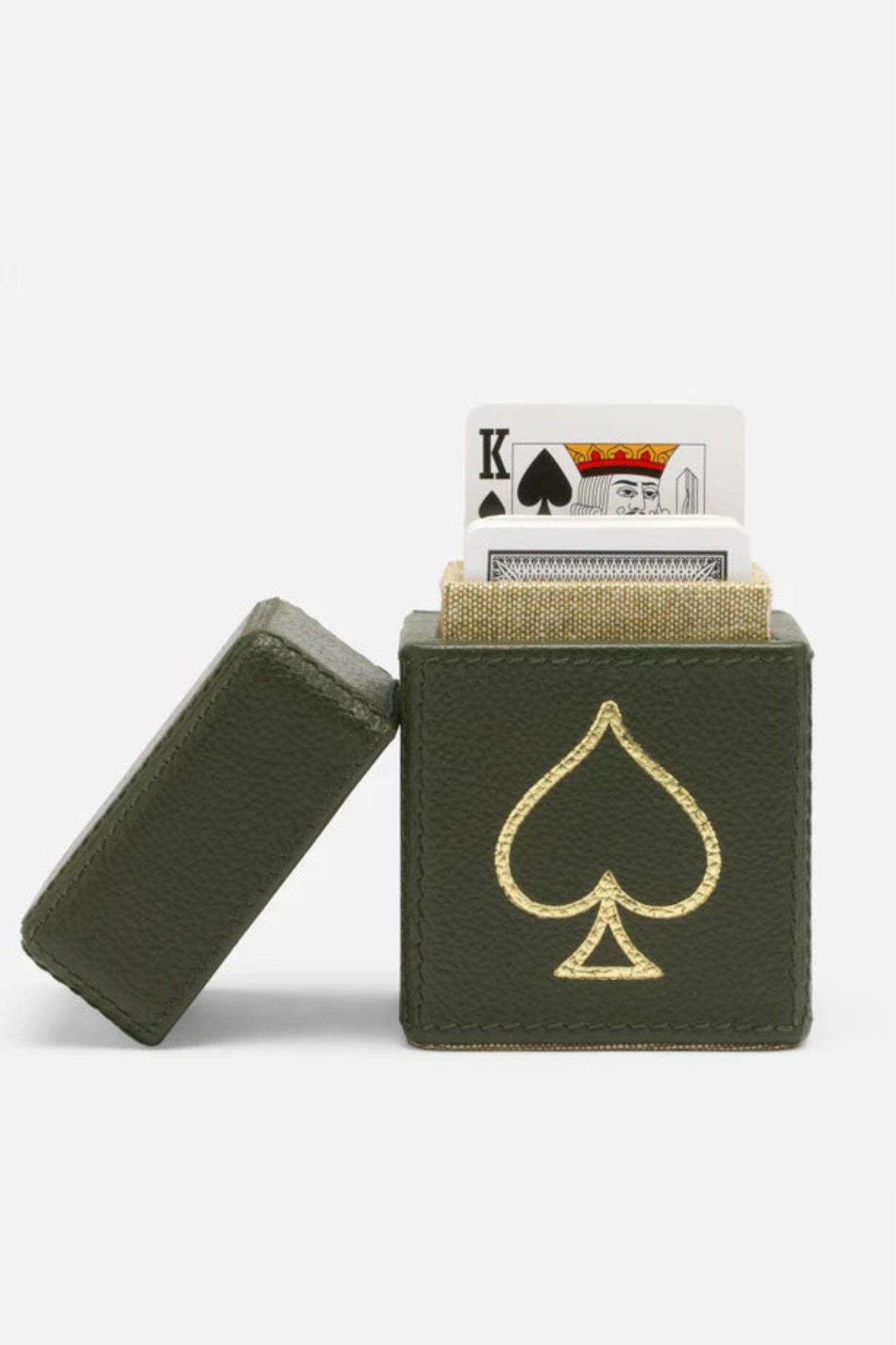 Green deck of cards with a spade symbol on a white background