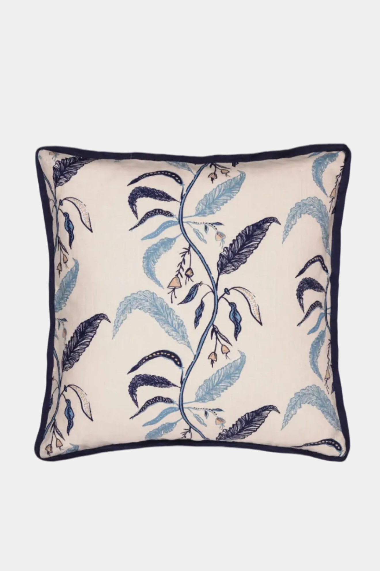 Decorative pillow with blue and black leaf pattern on a white background