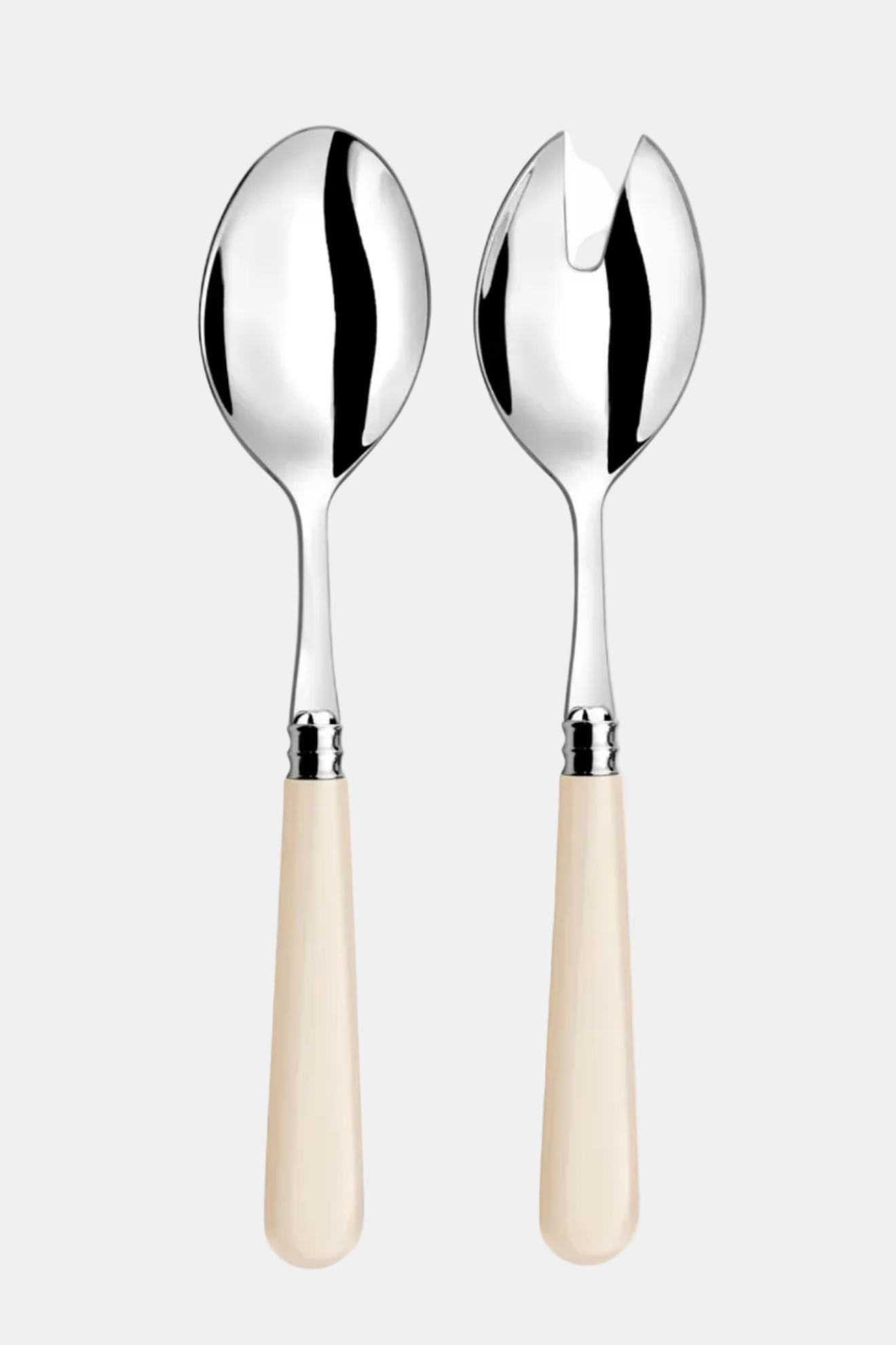 Two spoons with silver bowls and beige handles on a white background