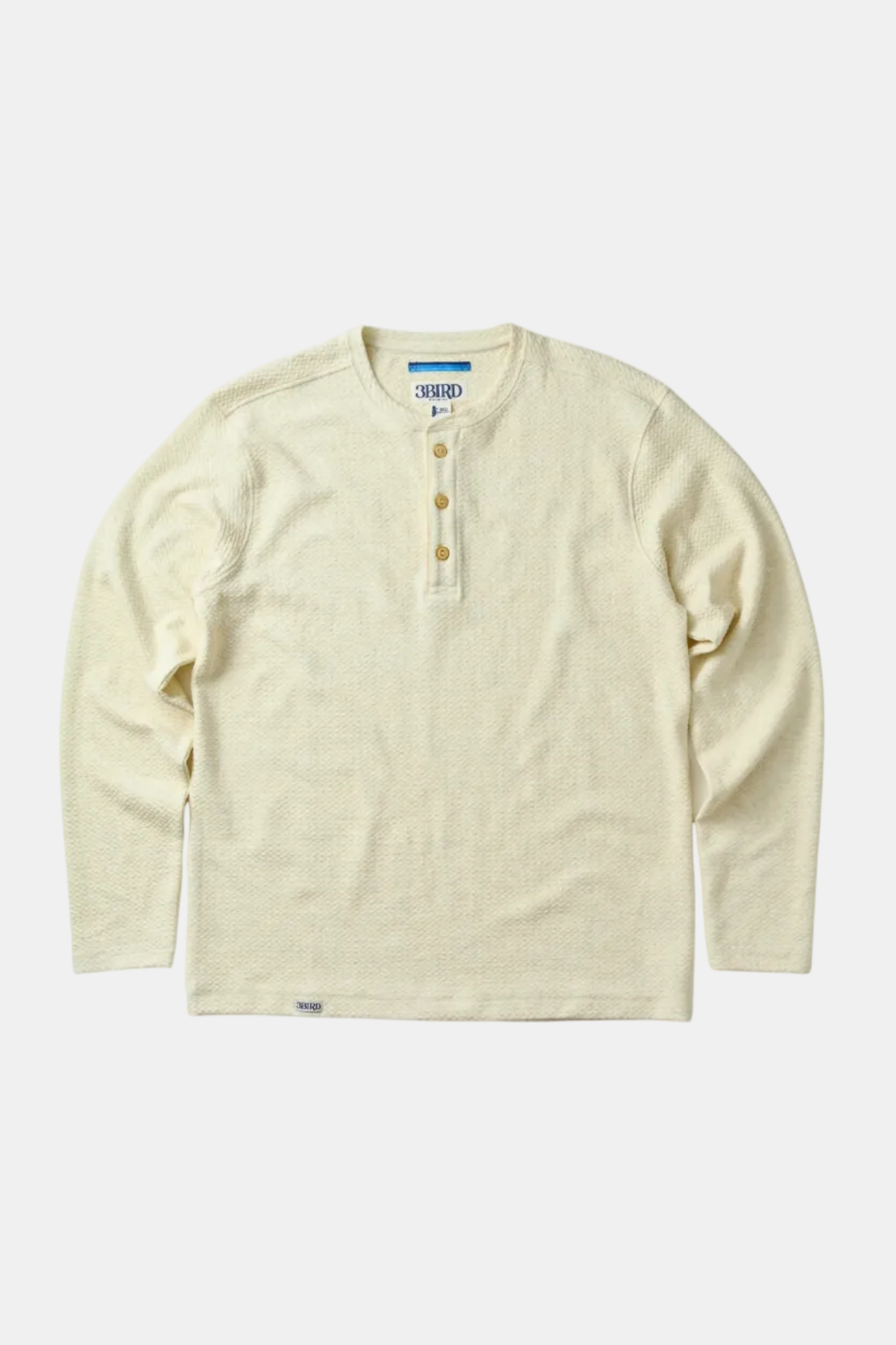 Beige long-sleeve henley shirt on a white background