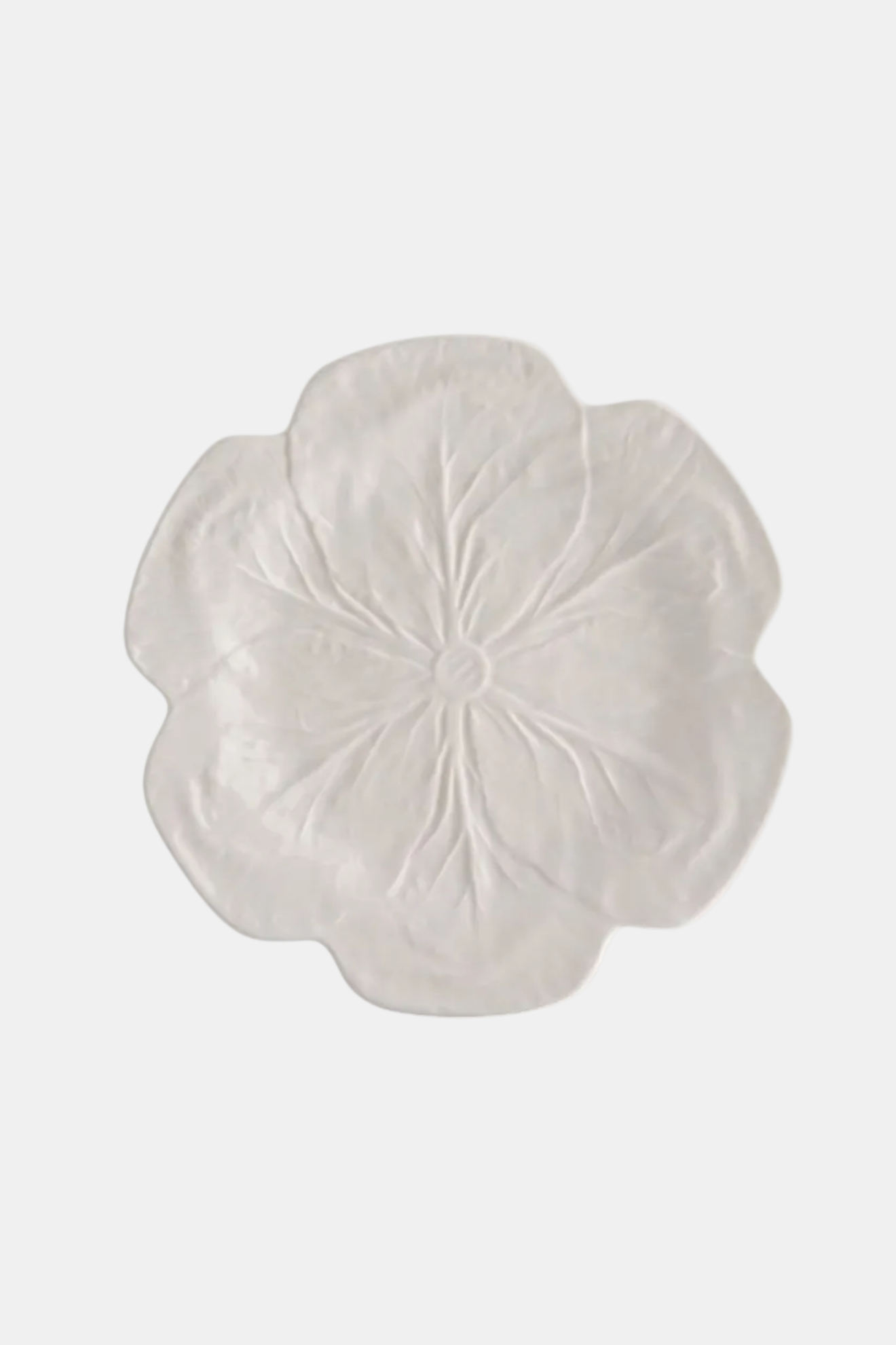 Decorative white flower-shaped object on a white background