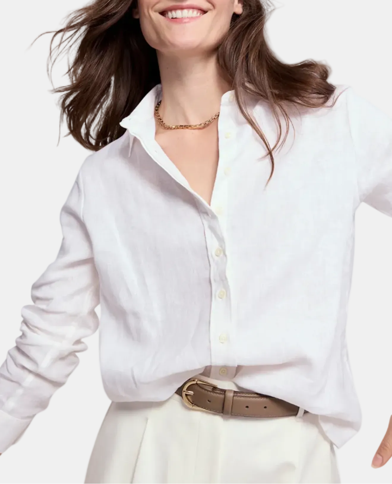 Woman wearing a white shirt with a brown belt on a white background
