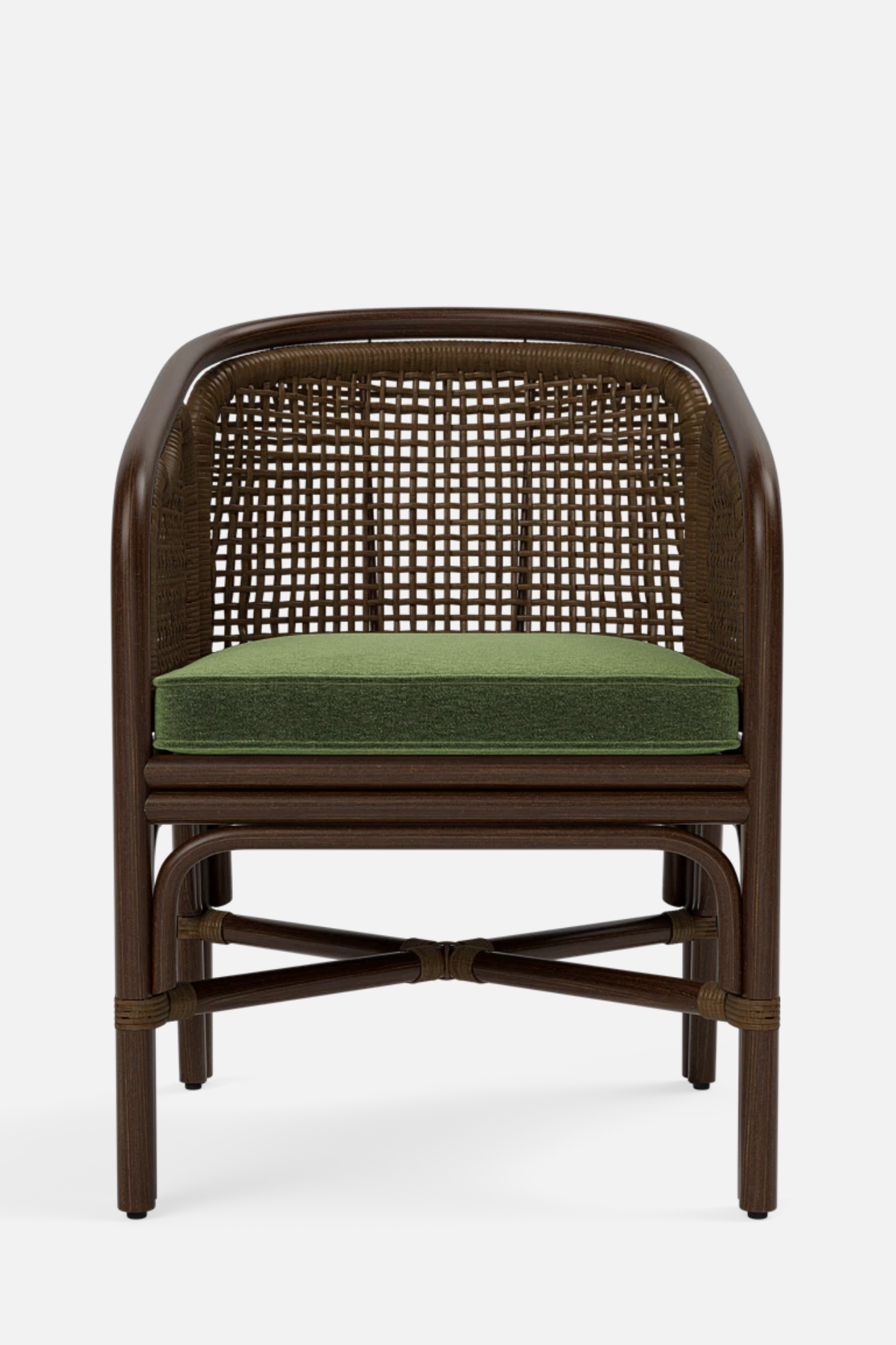 Wicker chair with a green cushion on a white background