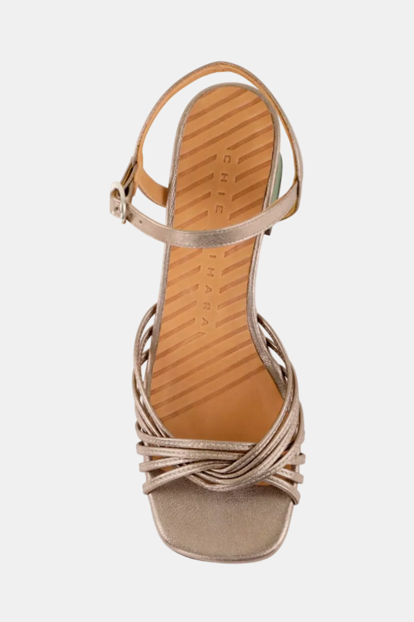 Gold sandal with criss-cross straps on a white background